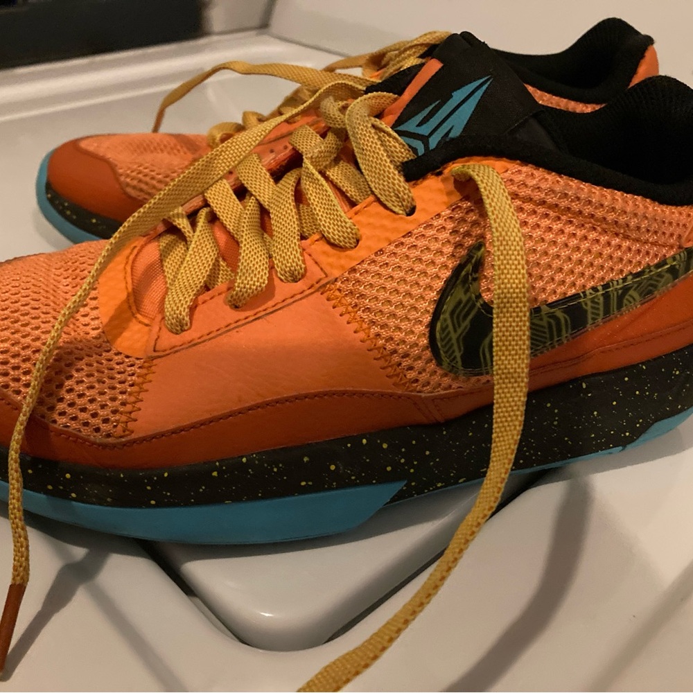 Nike Vibrant Orange Sneakers with Blue Sole